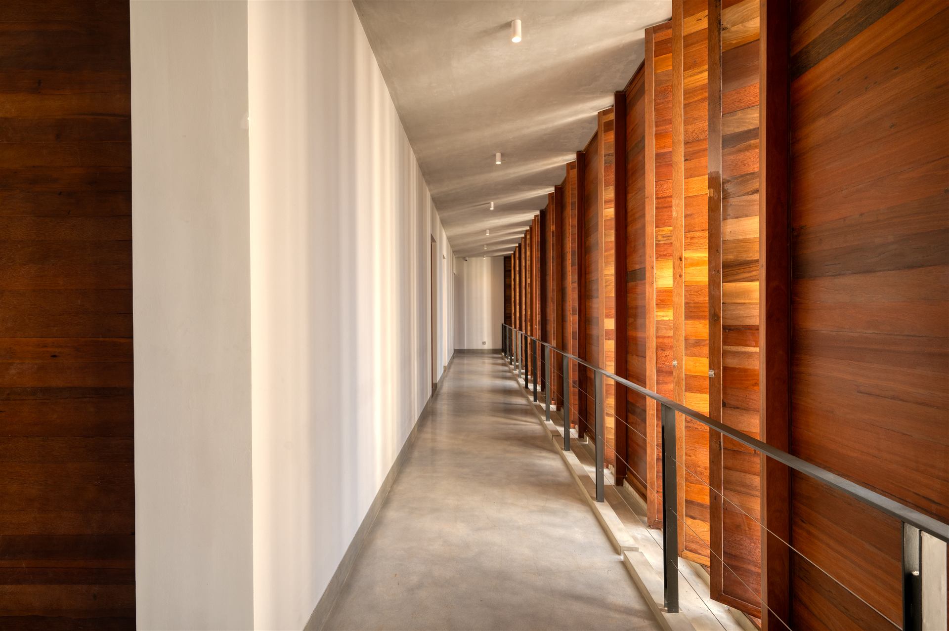 Corridor lined with timber louvres